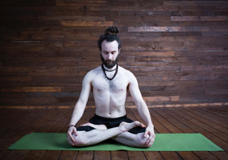 Rob in Padmasana or Lotus Pose